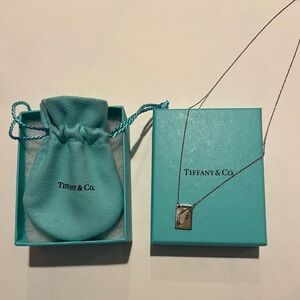 Tiffany & Co. Silver Nike Women’s Half Marathon Necklace Pendant with bag/box